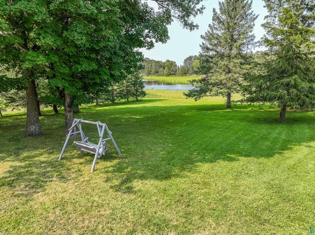 view of yard with a water view