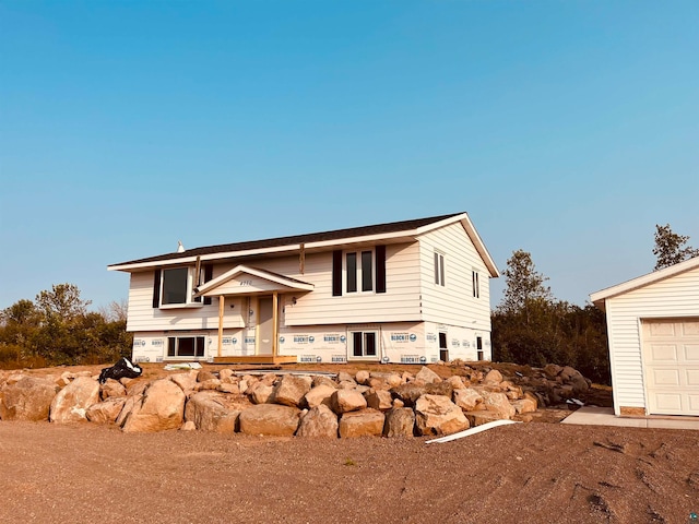 raised ranch featuring a garage