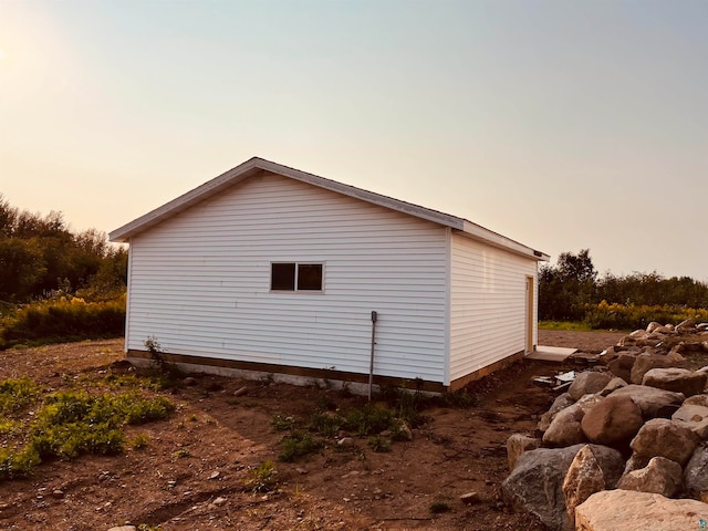 view of property exterior at dusk