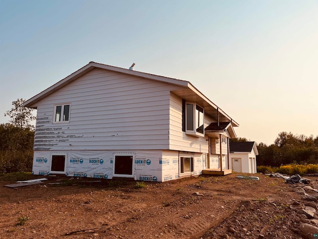 view of property exterior at dusk