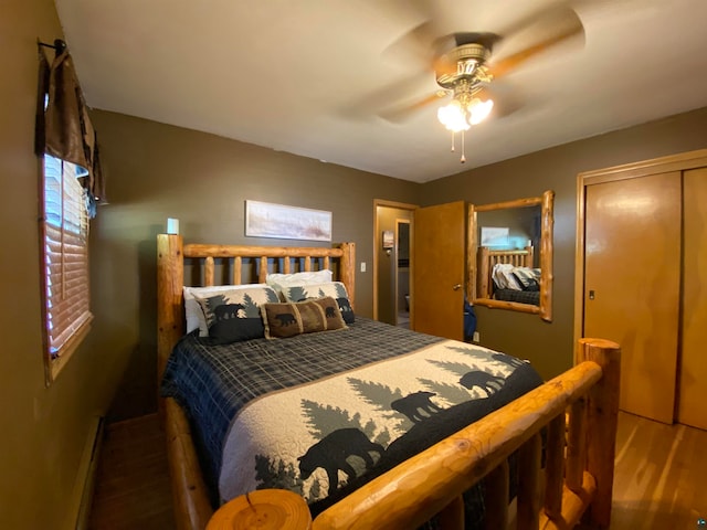 bedroom featuring ceiling fan and a closet