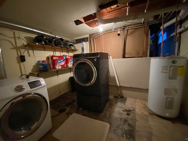 laundry room featuring water heater and separate washer and dryer