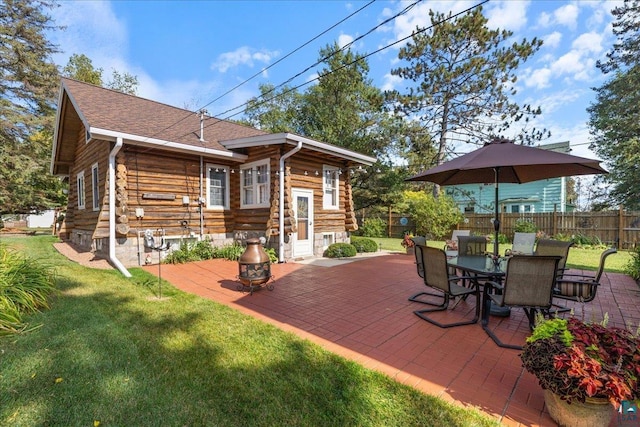 exterior space featuring a patio and a yard