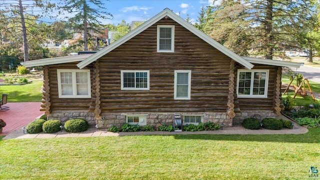 view of property exterior featuring a yard