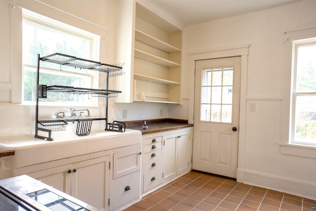 interior space with a healthy amount of sunlight and tile patterned flooring