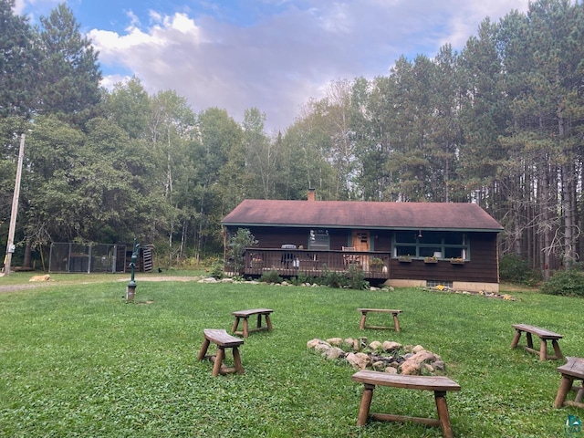 view of yard featuring a wooden deck