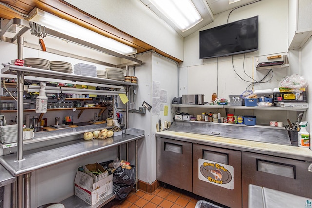 kitchen featuring light tile patterned flooring