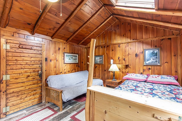 bedroom featuring wood ceiling, vaulted ceiling, wood walls, and dark hardwood / wood-style floors