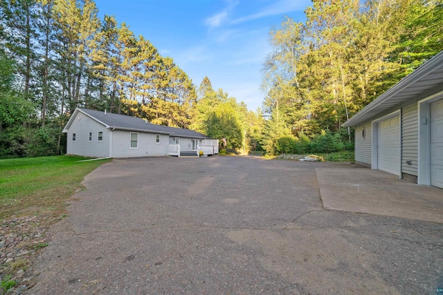 view of side of property with a garage