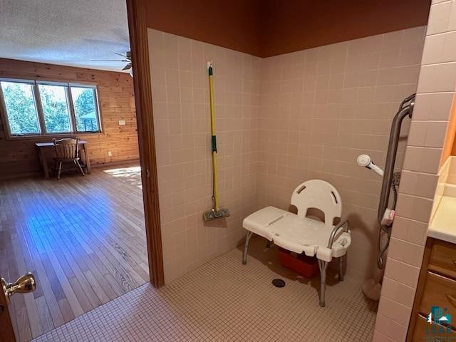 bathroom featuring vanity, a textured ceiling, and hardwood / wood-style floors