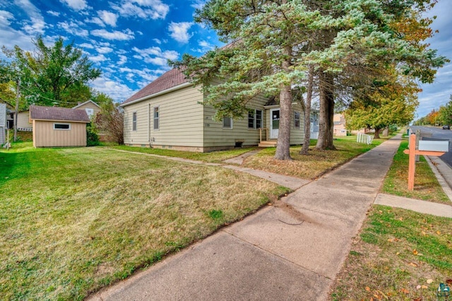 exterior space with a storage shed