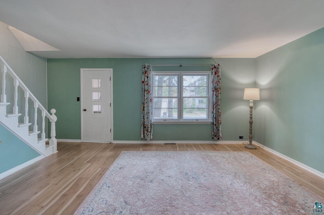 entryway with light hardwood / wood-style flooring