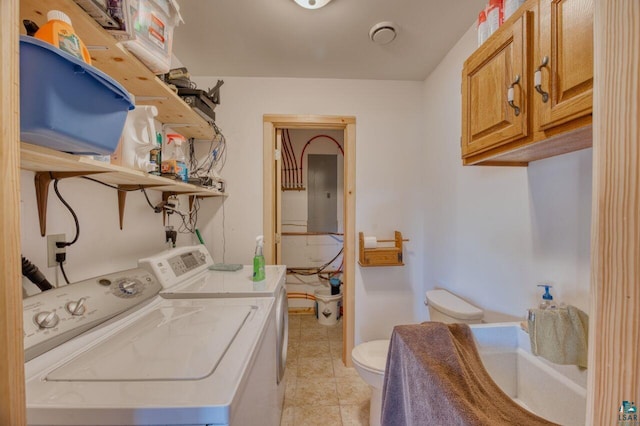 washroom featuring electric panel, separate washer and dryer, and light tile patterned floors