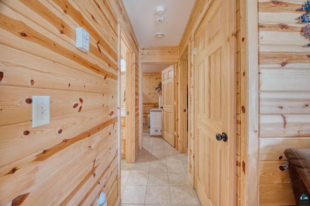 hallway with light tile patterned floors