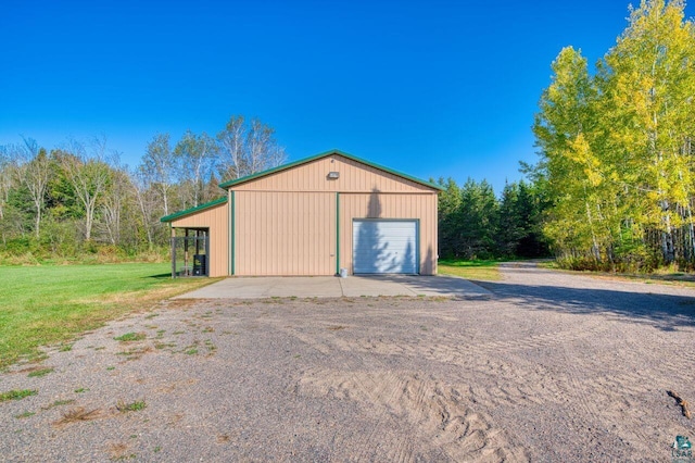 view of outdoor structure featuring a garage