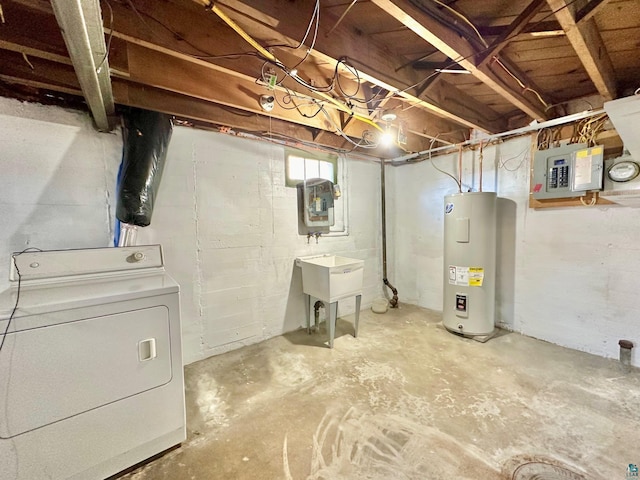 basement featuring water heater, sink, electric panel, and washer / dryer