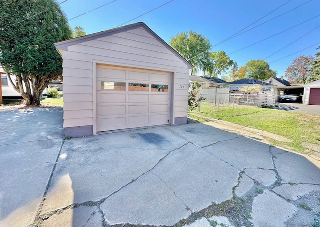 garage with a lawn