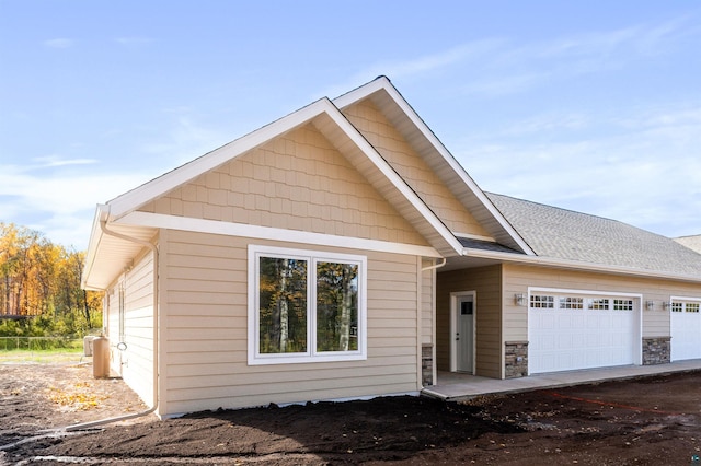 view of front of house with a garage