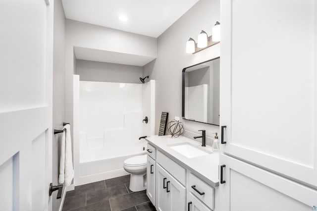 full bathroom with shower / bathing tub combination, vanity, toilet, and tile patterned floors