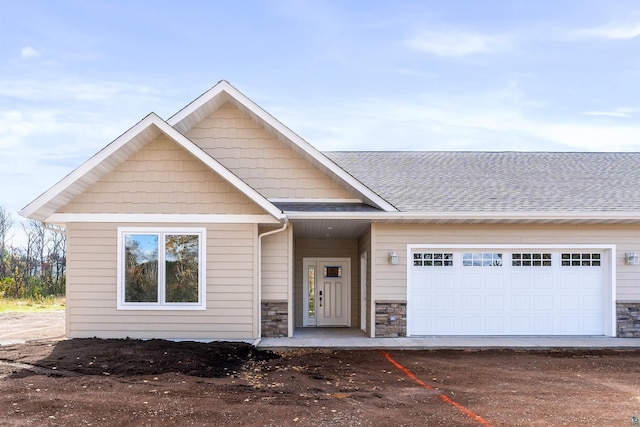 view of front of home with a garage