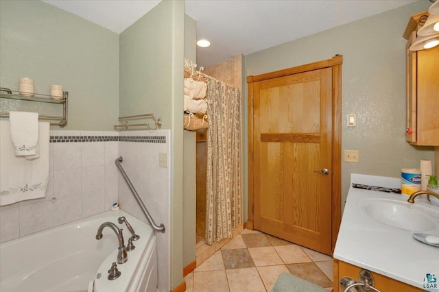 bathroom featuring vanity, tile patterned floors, and independent shower and bath