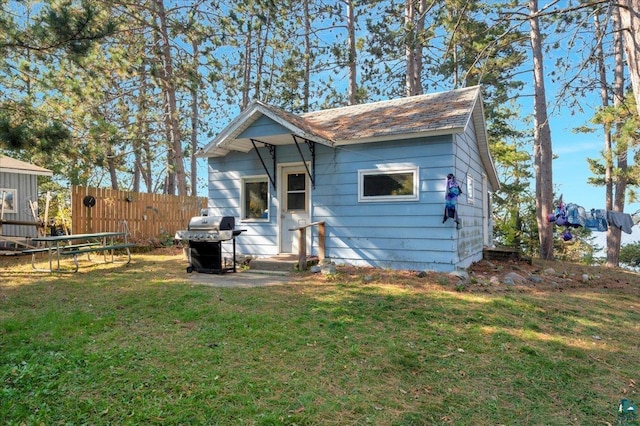 view of front of home with a front yard