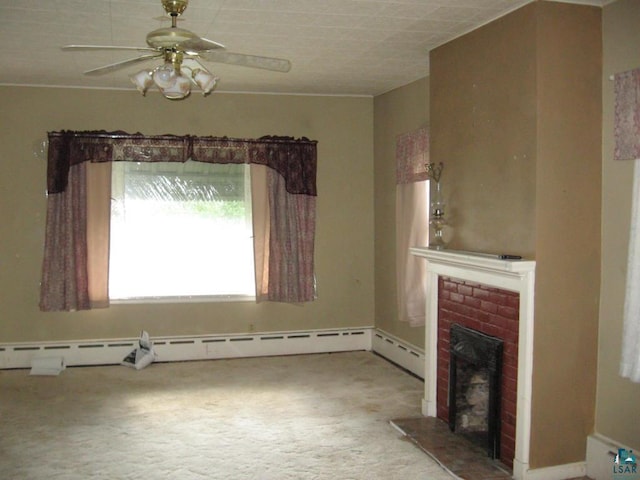 unfurnished living room with carpet floors, a baseboard radiator, a fireplace, and ceiling fan