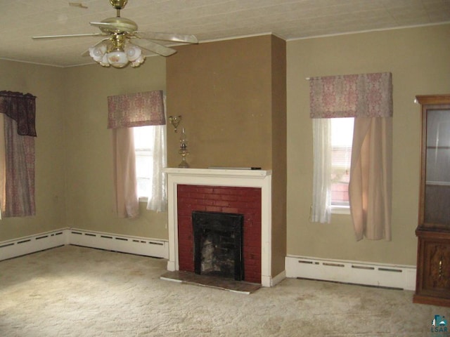 21 White St, Ely, MN 55731 - unfurnished living room with baseboard heating, healthy amount of natural light, a ceiling fan, carpet flooring, and crown molding