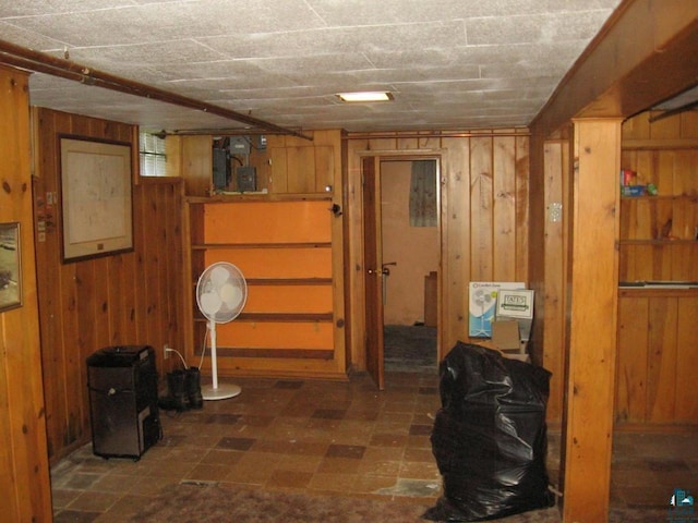21 White St, Ely, MN 55731 - below grade area with wooden walls and tile patterned floors