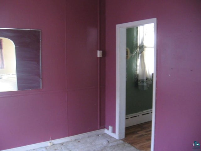 21 White St, Ely, MN 55731 - corridor with a baseboard radiator and baseboards