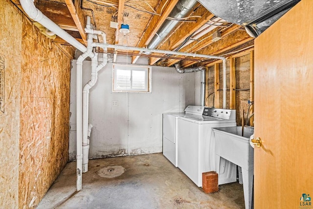 basement featuring washer and dryer