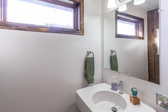 bathroom with a healthy amount of sunlight and sink