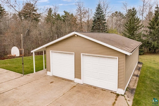 garage with a lawn