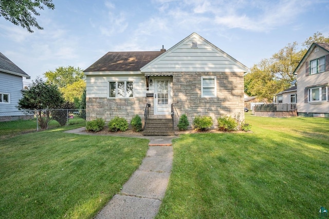 bungalow with a front yard