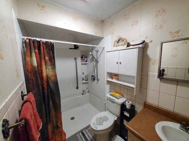 bathroom with vanity, toilet, tile walls, and curtained shower