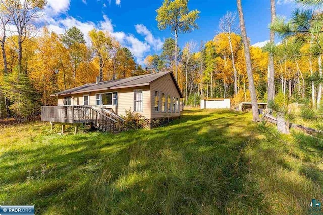 view of yard featuring a deck