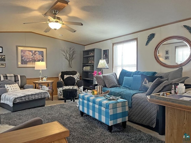 carpeted living room featuring a textured ceiling, wooden walls, lofted ceiling, and ornamental molding