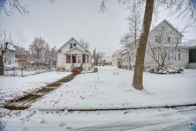 view of yard layered in snow