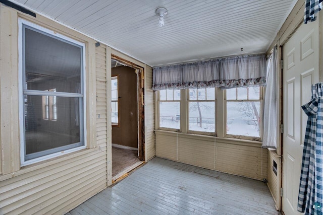 view of unfurnished sunroom