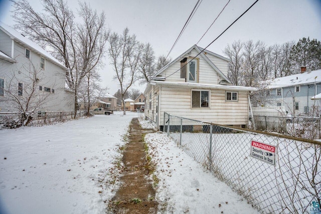 view of snow covered property