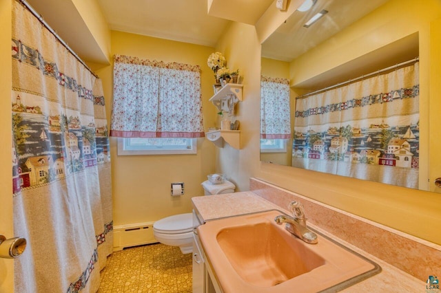 bathroom featuring a shower with curtain, vanity, a baseboard radiator, and toilet