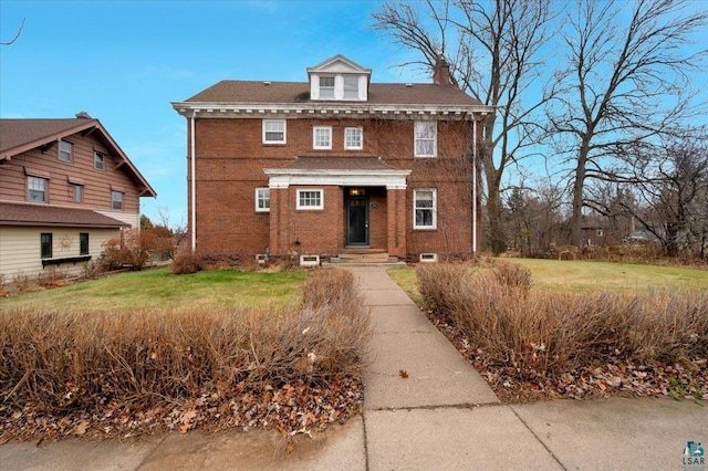 view of front facade with a front yard