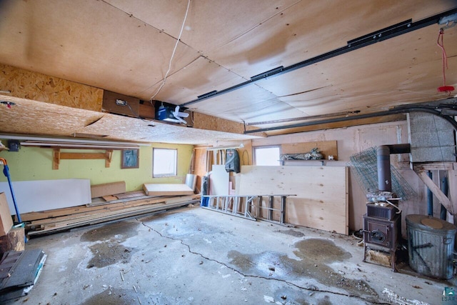 818 Douglas Ave, Eveleth, MN 55734 - garage featuring a wood stove