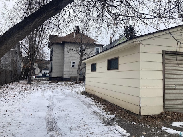 view of snow covered property