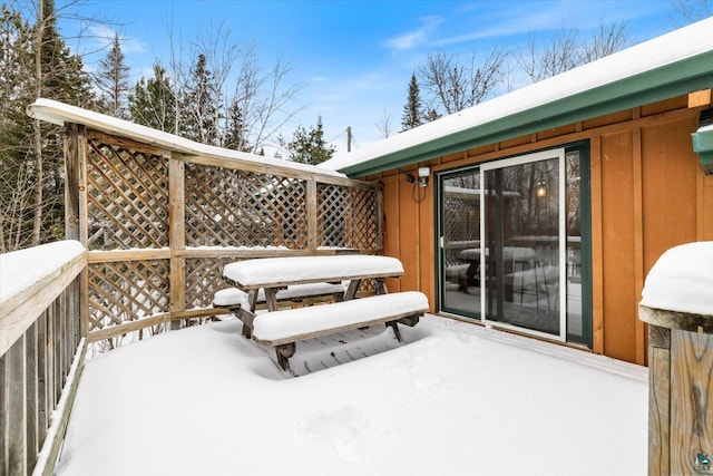 view of snow covered deck