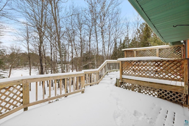 view of snow covered deck