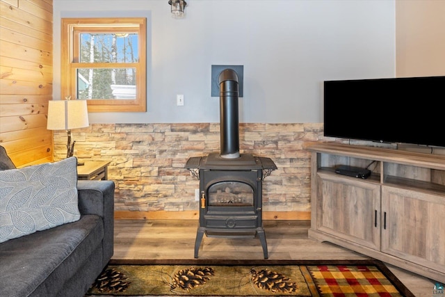 living room featuring a wood stove