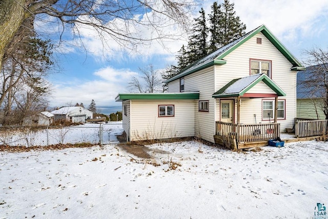 view of snow covered house