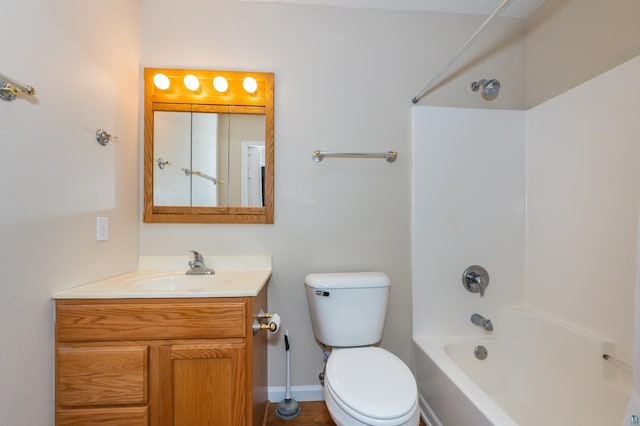 full bathroom with vanity,  shower combination, and toilet