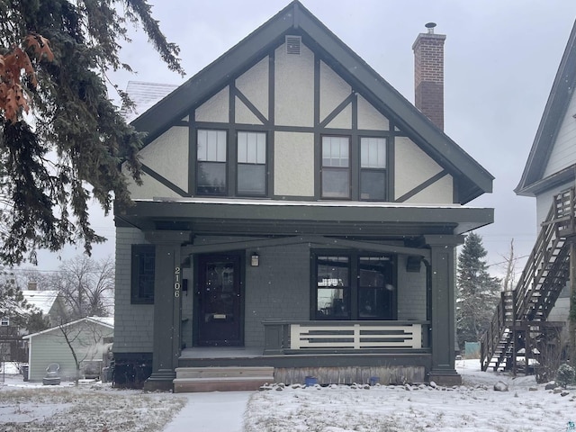 tudor house with a porch